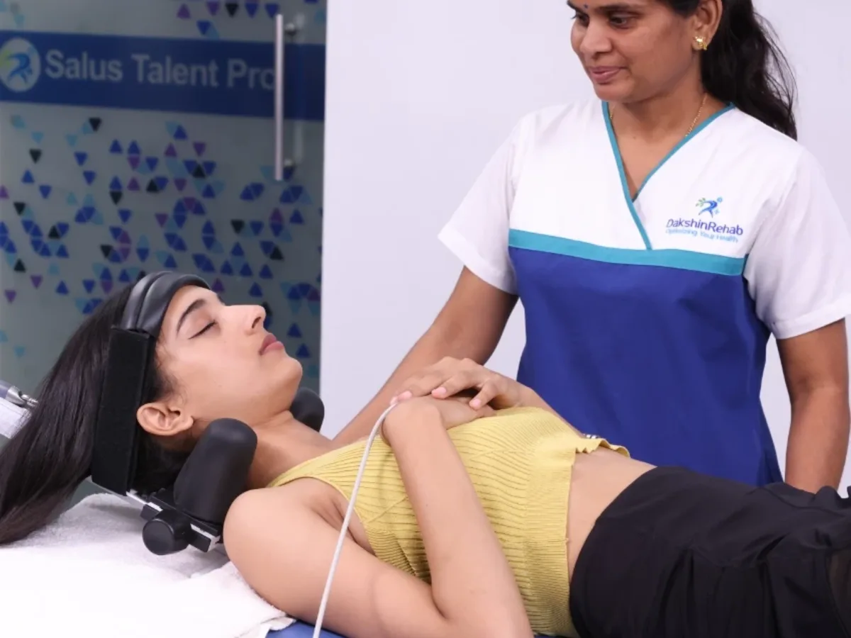 Patient receiving non-surgical spinal decompression therapy at DakshinRehab