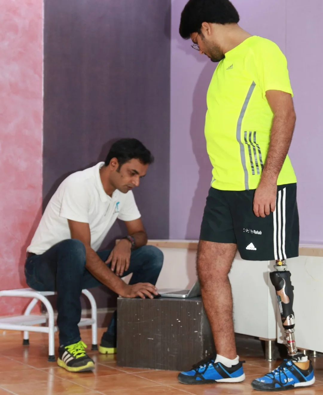 Patient with a hip-disarticulation prosthesis during gait assessment with a prosthetist at DakshinRehab Moosapet