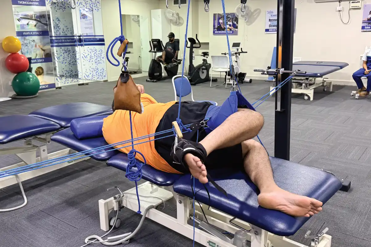 Redcord Neurac suspension training for knee rehabilitation at DakshinRehab Moosapet