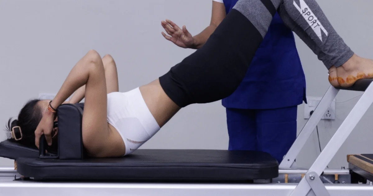 Clinical Pilates session with physiotherapist supervision
