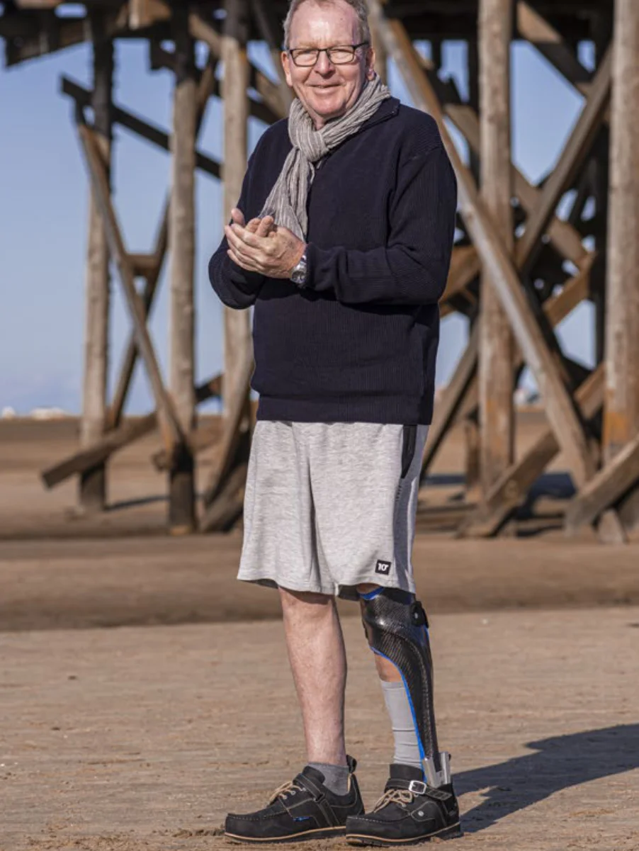 Full length lower-limb orthotic support for neurological gait instability
