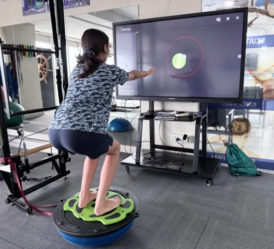Patient engaged in virtual reality rehabilitation exercise