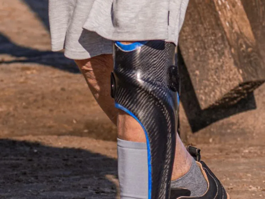 Close view of ankle foot orthosis alignment with supportive footwear