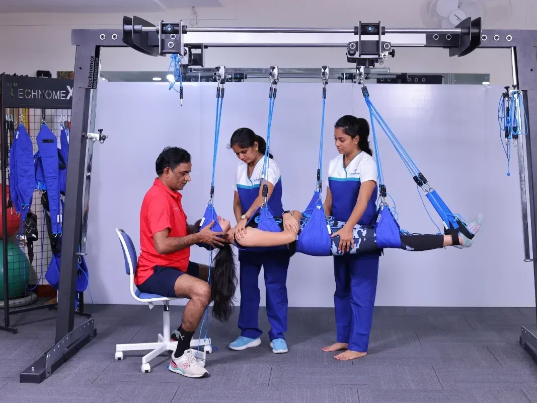 Redcord Neurac suspension retraining for sciatica and radiculopathy at DakshinRehab Moosapet.